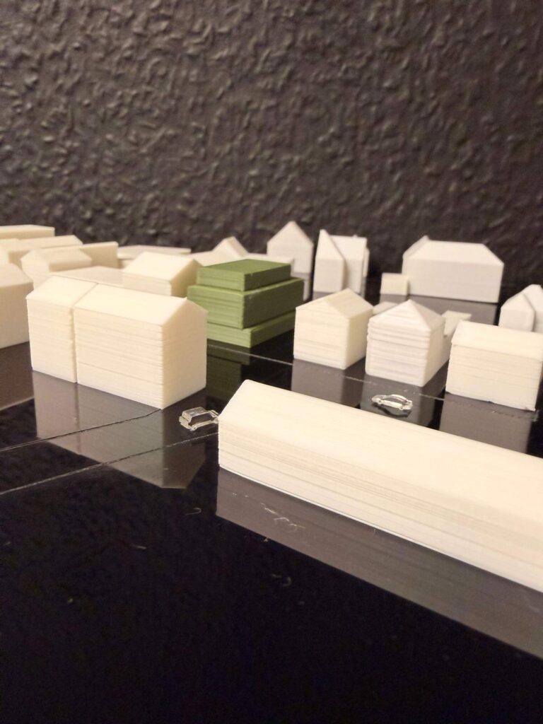 Städtebauliches Modell MK.06 mit grün markiertem Neubau
